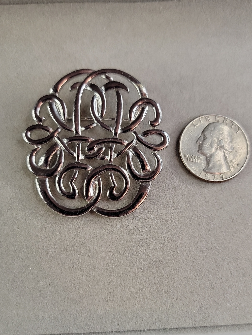 Vintage 1989 Avon Silver-Tone Openwork Swirl Brooch